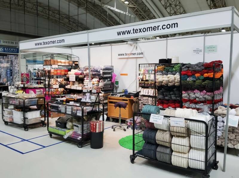 Finn Texomer at a trade fair booth.